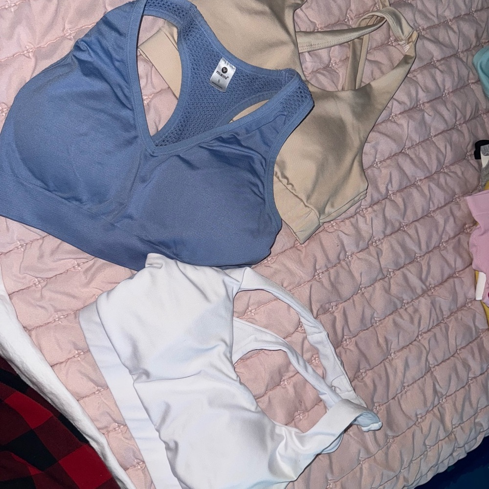 Blue, Beige, and White Sports Bras